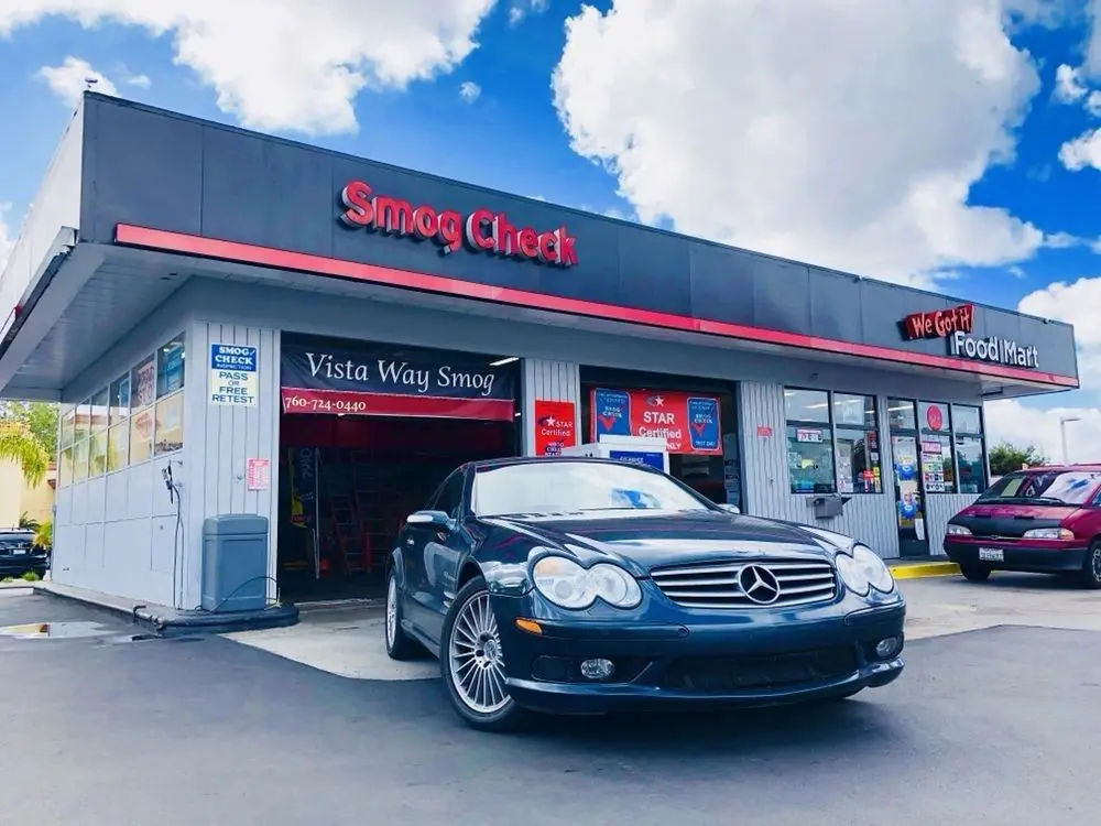 A car parked in front of a store.